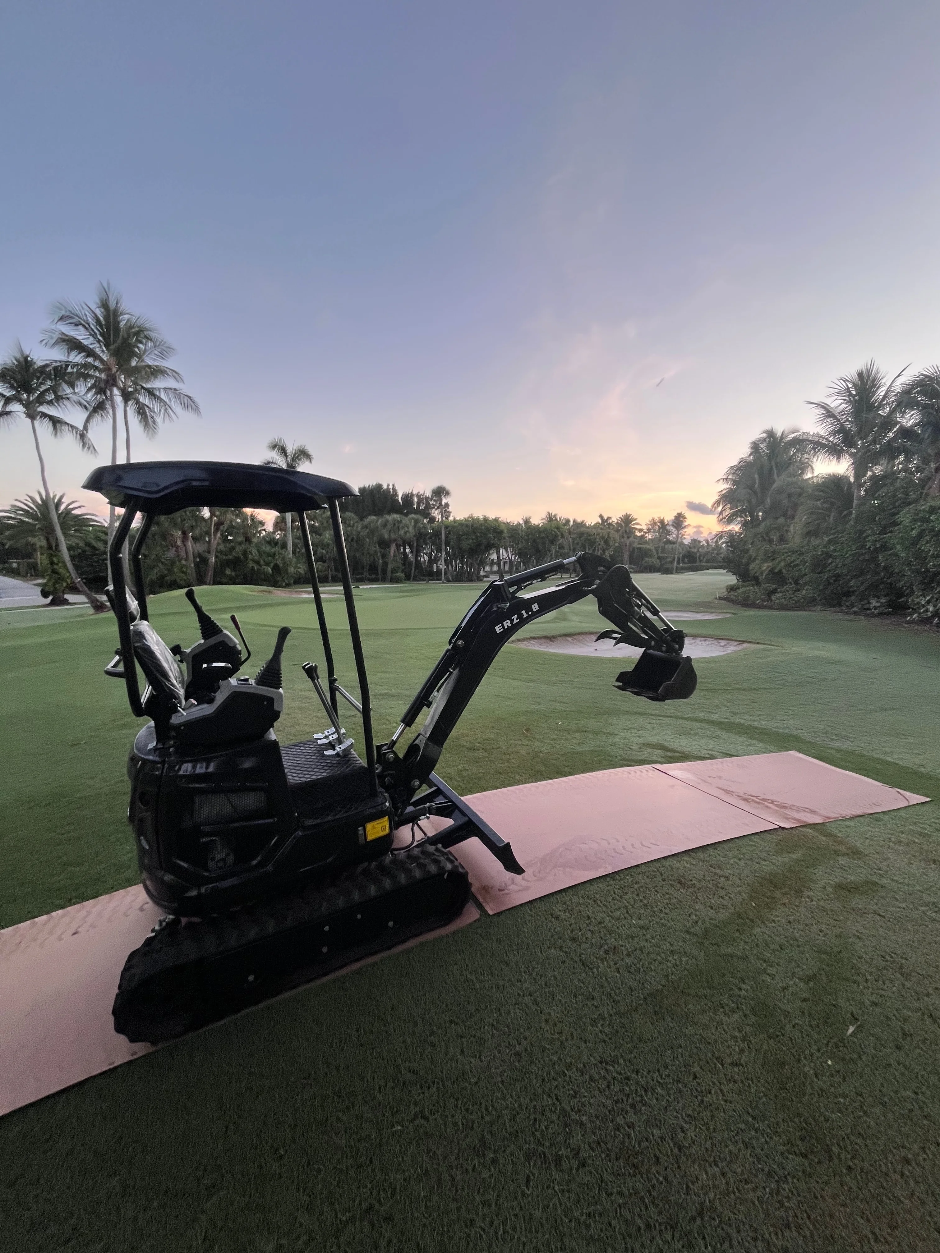 Mini excavator rental Stuart FL — ERZ 1.8 on golf course, Equiprent LLC